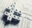 dices over newspaper, profit, loss risk