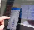 black android smartphone turned on screen